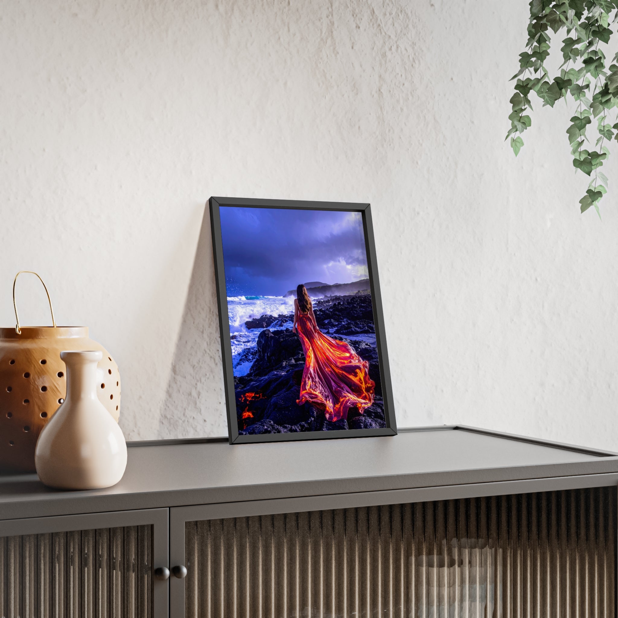 Framed Art Print — Woman in Fiery Red Dress on Rocky Shore (Wooden Frame Poster)