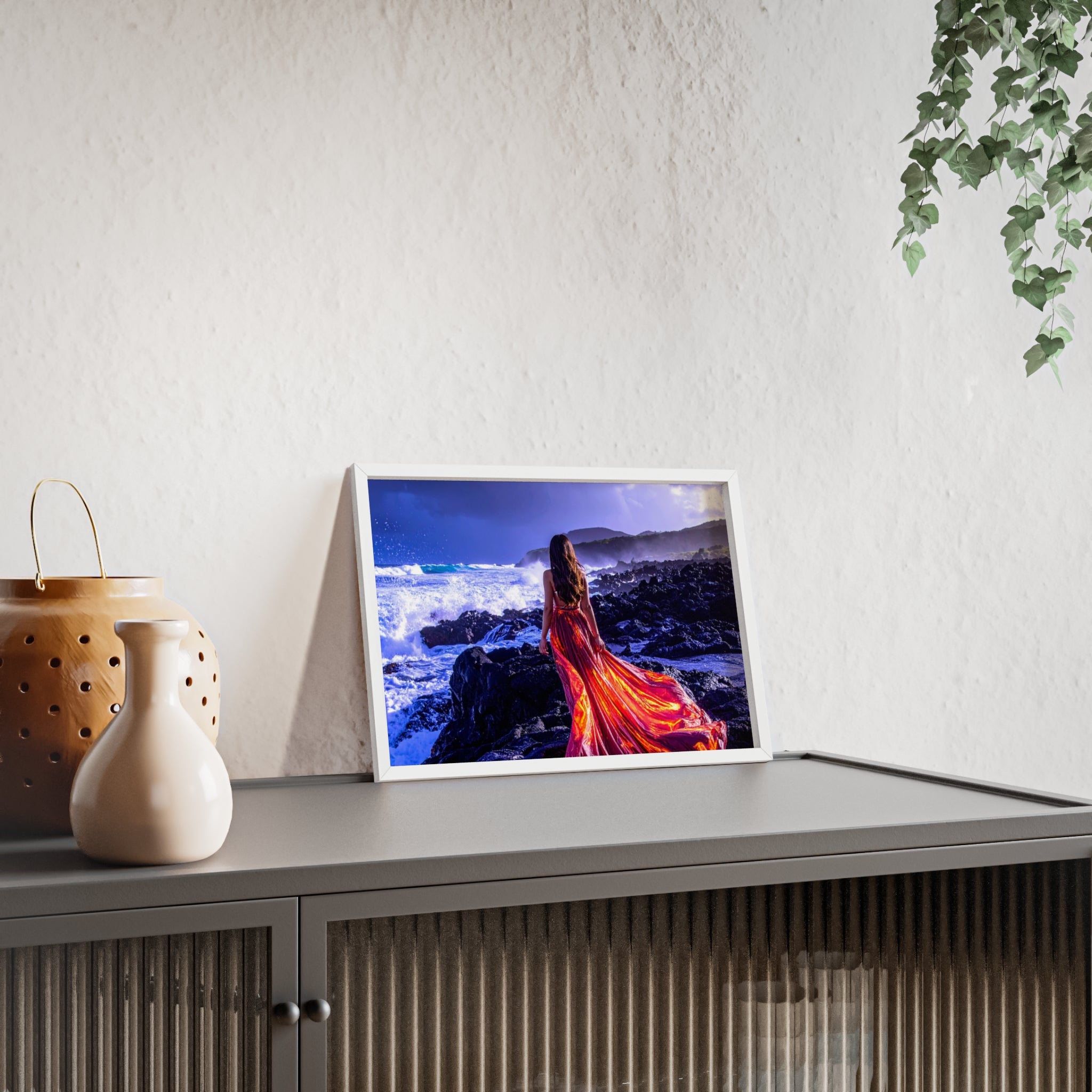 Framed Art Print — Woman in Fiery Red Dress on Rocky Shore (Wooden Frame Poster)