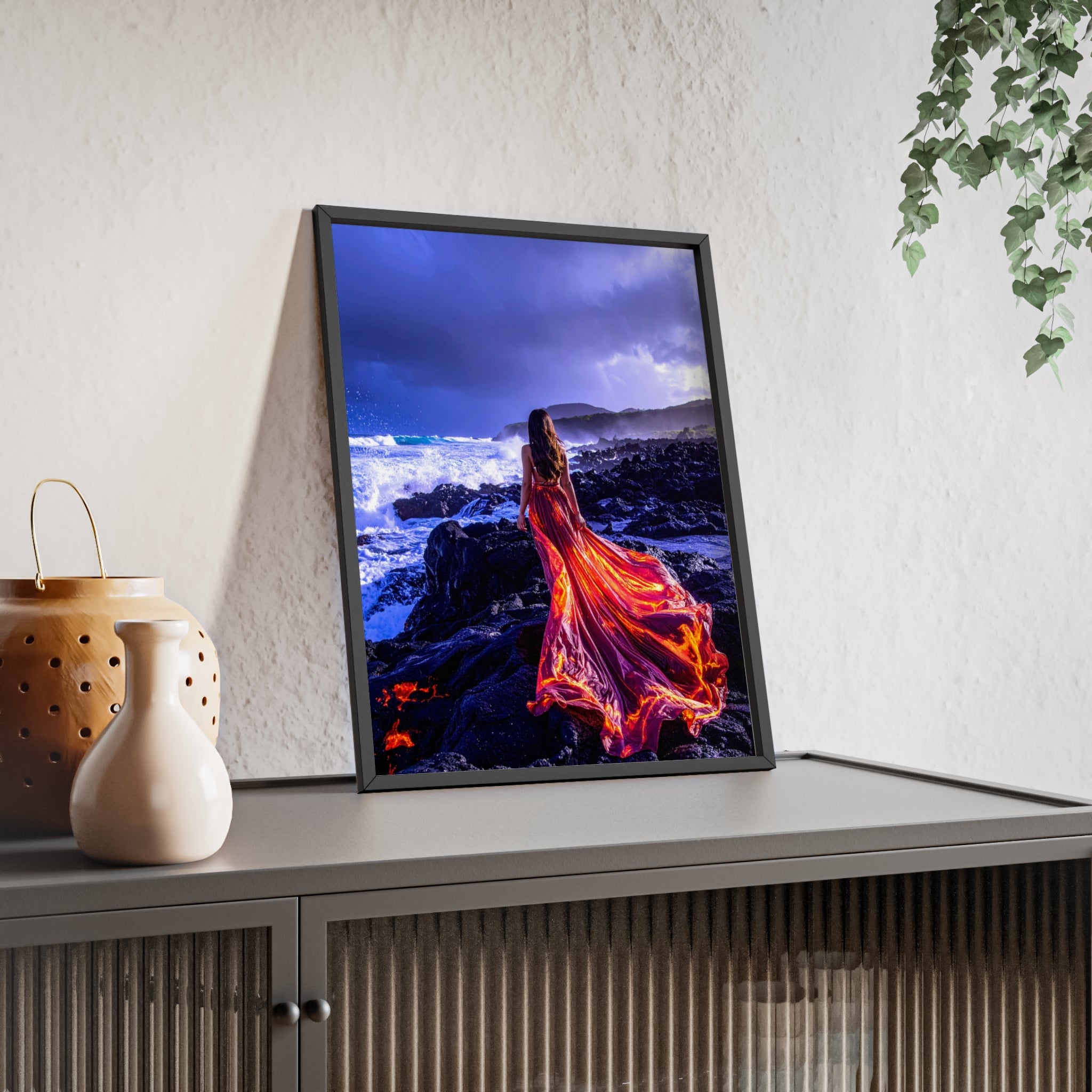 Framed Art Print — Woman in Fiery Red Dress on Rocky Shore (Wooden Frame Poster)