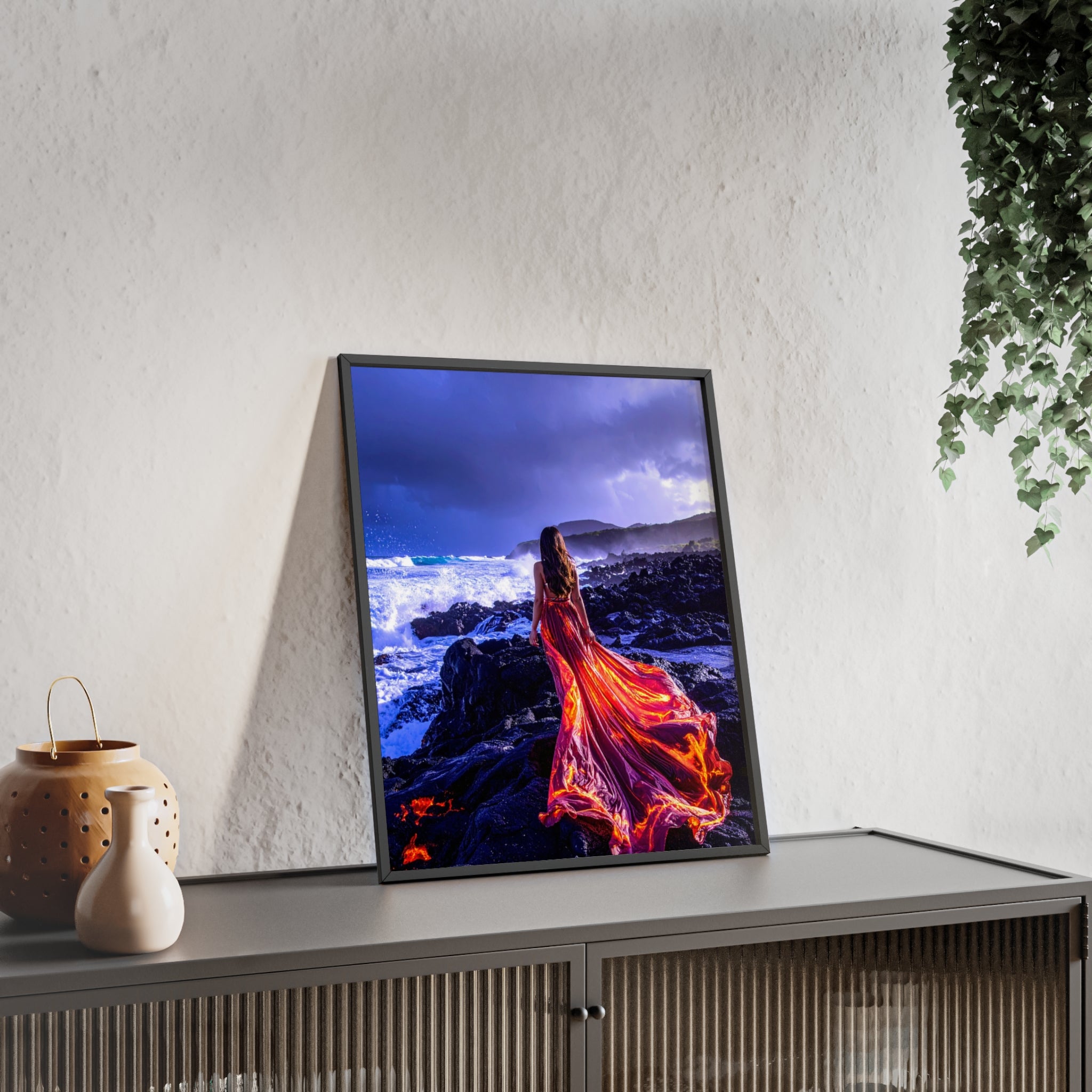 Framed Art Print — Woman in Fiery Red Dress on Rocky Shore (Wooden Frame Poster)