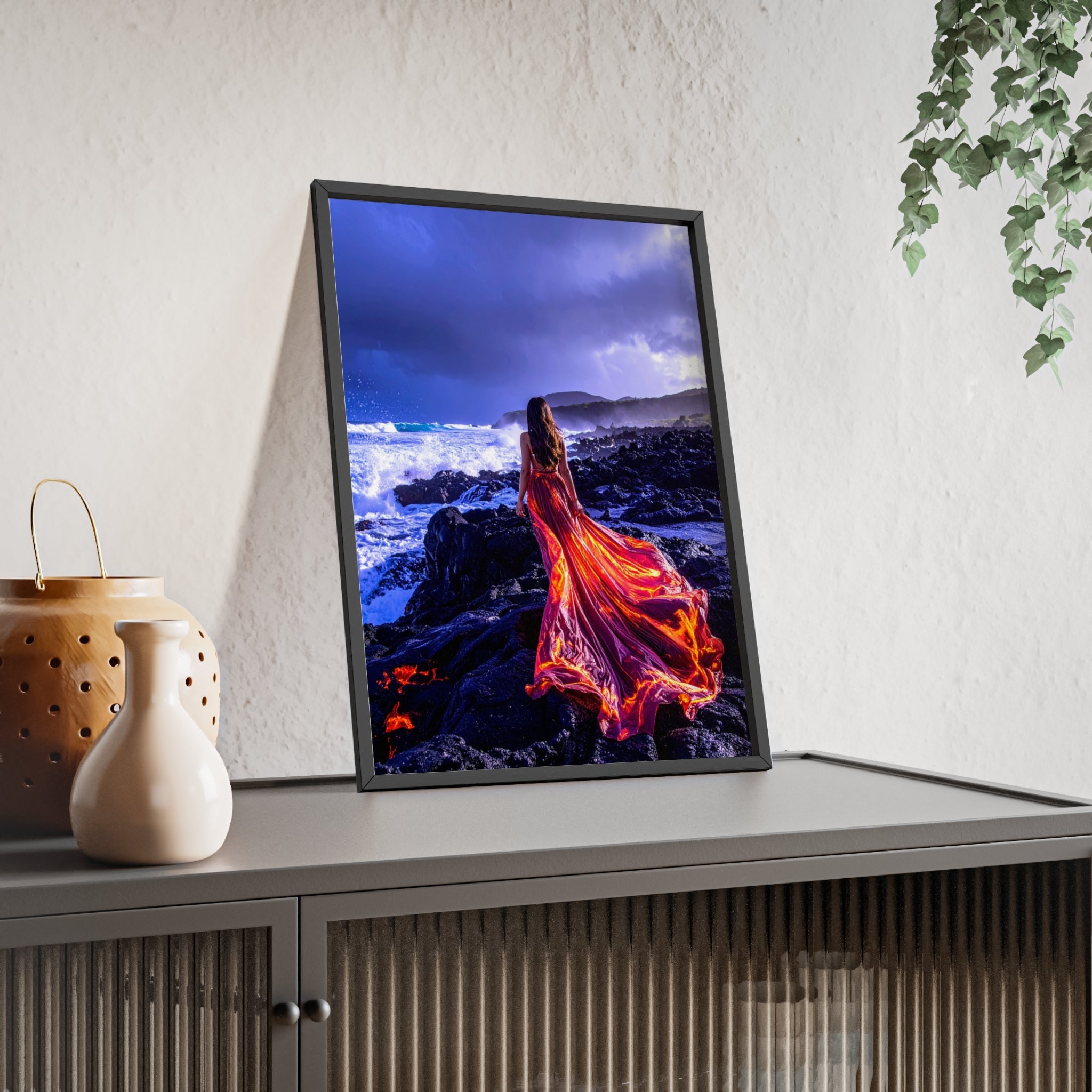 Framed Art Print — Woman in Fiery Red Dress on Rocky Shore (Wooden Frame Poster)