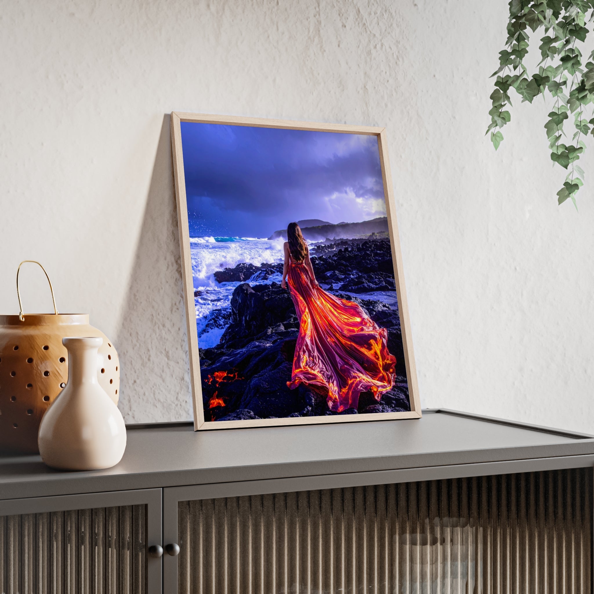 Framed Art Print — Woman in Fiery Red Dress on Rocky Shore (Wooden Frame Poster)